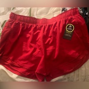 XXL red athletic shorts. Underwear built in. Dri- fit material